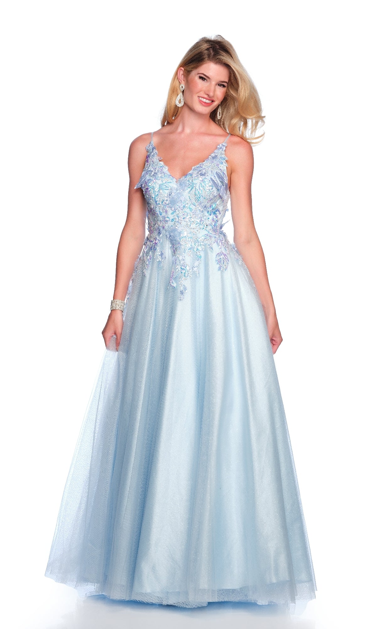 A woman stands against a white background wearing the Dave and Johnny 12063 long prom dress, showcasing its light blue embroidered bodice and elegant A-line tulle skirt.